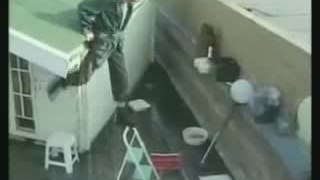 Man Falls From Roof