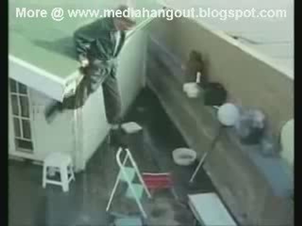 Man Falls From Roof