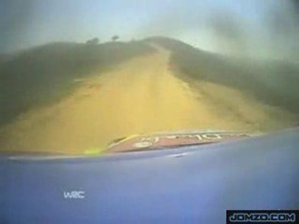 rally driver goes off edge of cliff