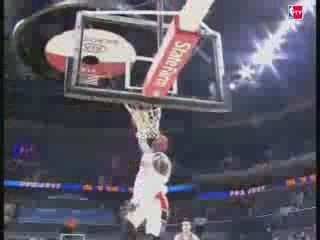 Gerald Wallace with the steal and windmill jam