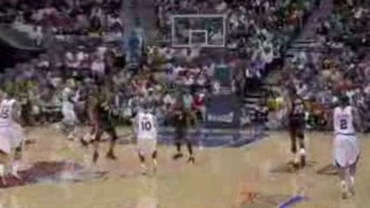 NBA Josh Smith slams home a long pass from Mike Bibby.