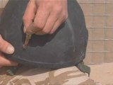 Lucky soldier survives bullet through helmet