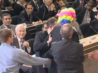 Protester dressed as a clown attacks Iran's leader