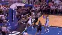 NBA Howard grabs a board above the rim and flushes it.