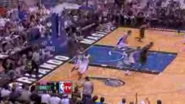 NBA Dwight Howard blocks Andre Miller's layup attempt.