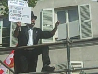 SarkoCaricature au défilé du 1er Mai à Paris