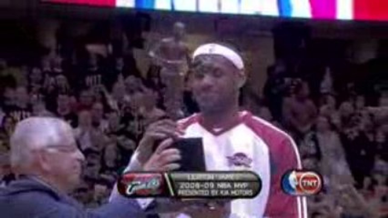NBA LeBron James accepts the NBA MVP award from Commissioner