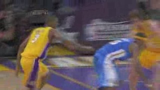 Trevor Ariza makes the swipe of Carmelo Anthony and heads th