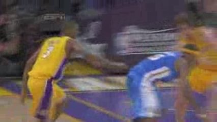 Trevor Ariza makes the swipe of Carmelo Anthony and heads th