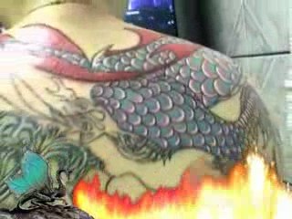 Tattoo dragon by Jean Paul Zilli, no mágico Ossamá Sato