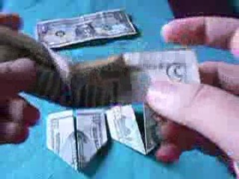 Complot illuminati Dollars Pliés