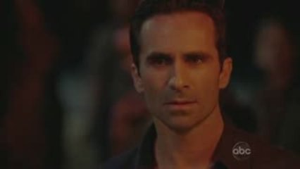 What lies in the shadow of the statue