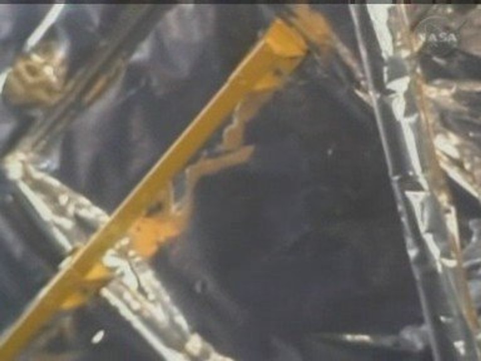 Atlantis shuttle joins up with Hubble in Earth's orbit