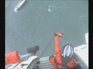 Coast Guard saves three from fouled sailboat