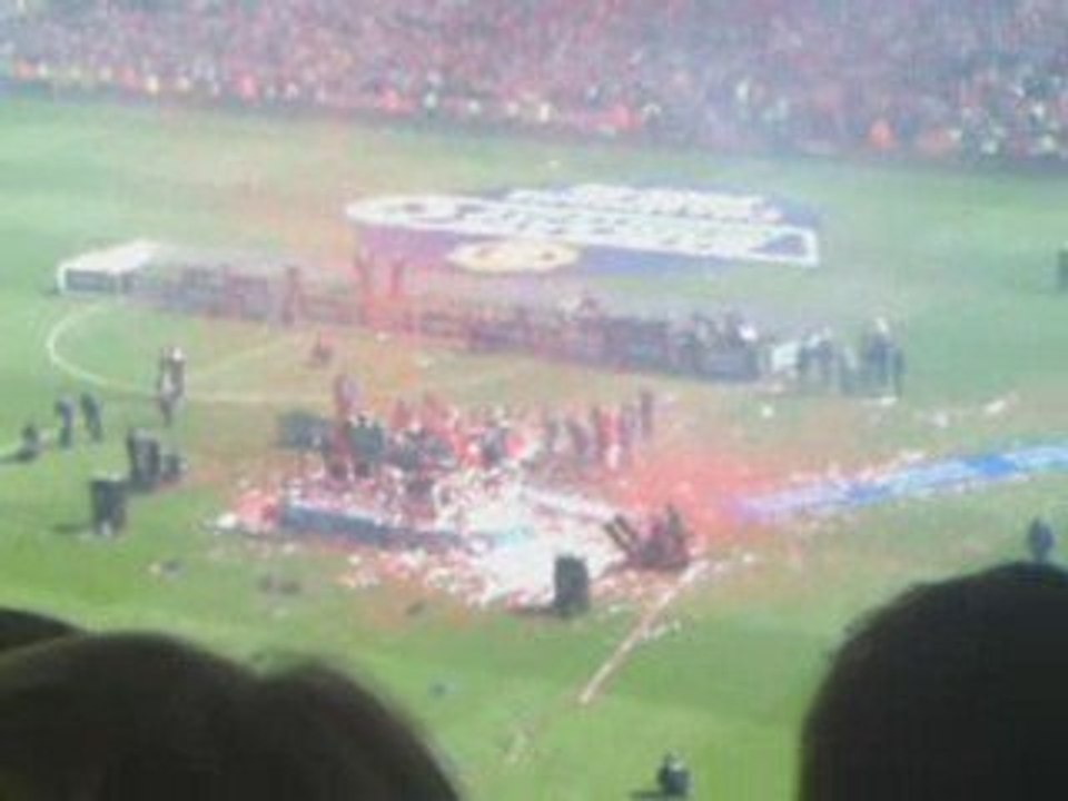 Celebrating with the trophy
