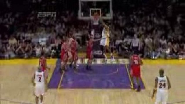 Andrew Bynum cleans up a missed lay up by Pau Gasol.