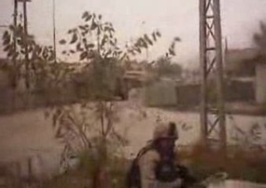 US Marines ambush insurgents in a building.