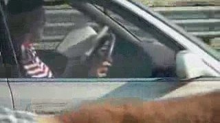 Man Driving 75 mph While Reading Novel