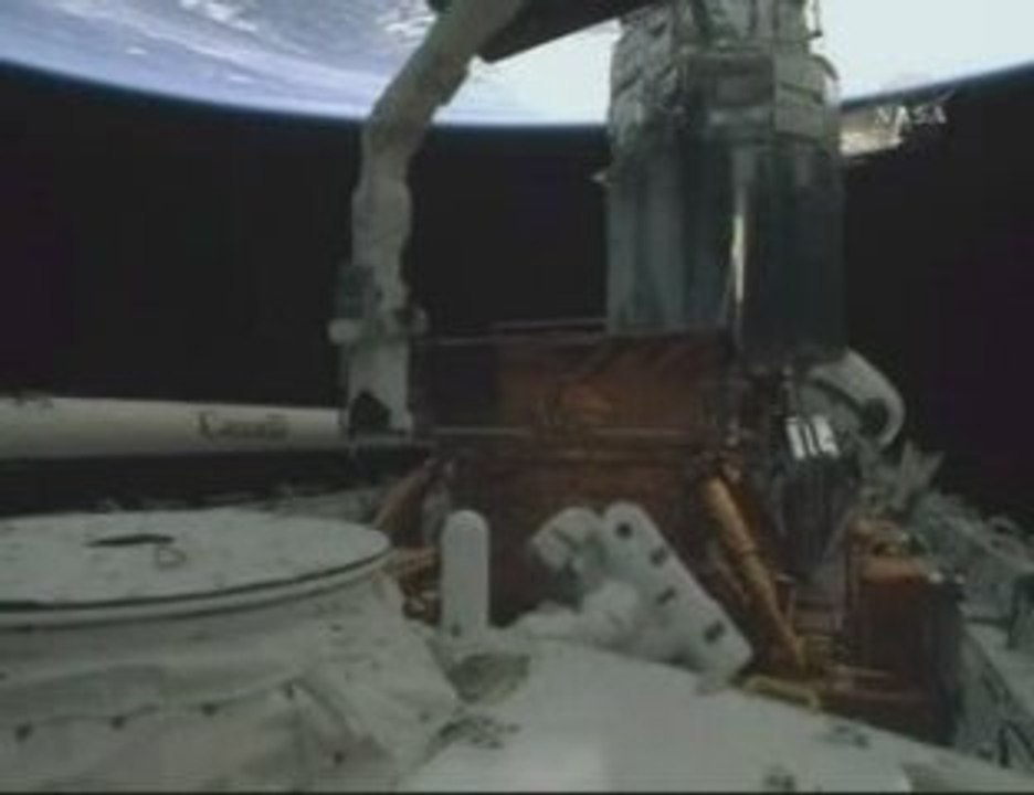 sts 125-Space walker..les bricolos de l'espace.11 mai 2009.