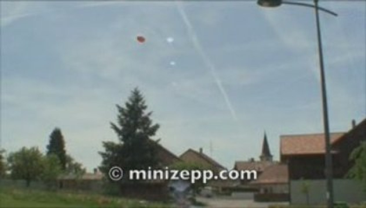 zeppelin flight over a small village