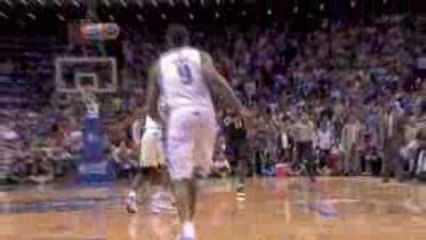 LeBron James takes the ball hard to the hoop in the fourth q