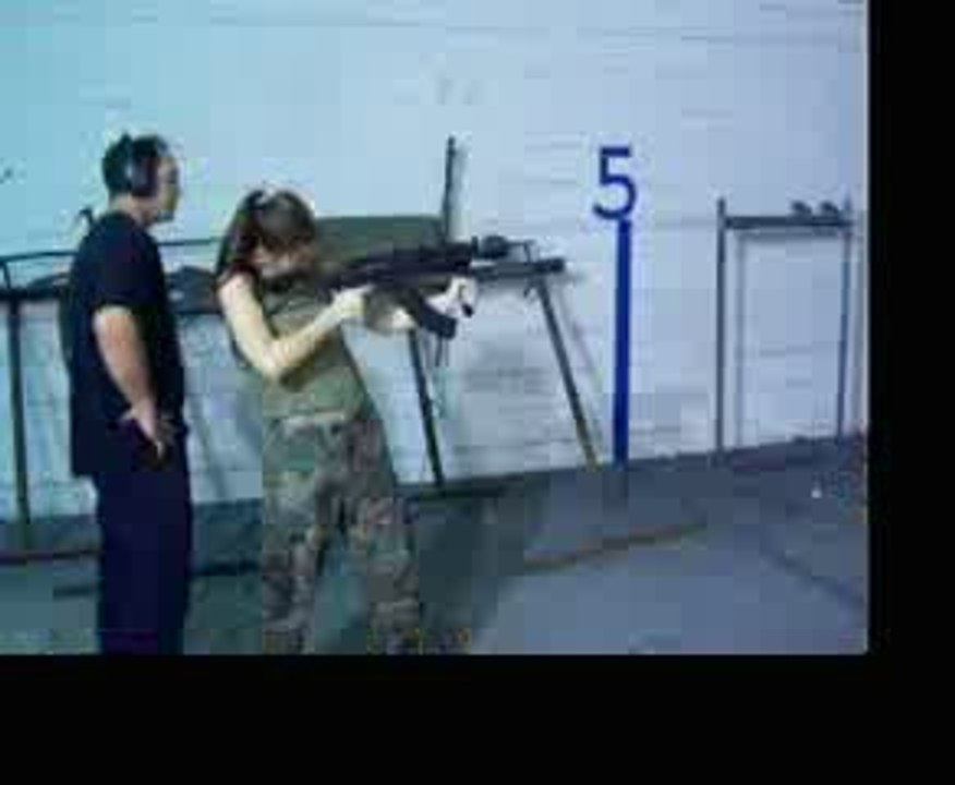 Girl Firing a Krinkov