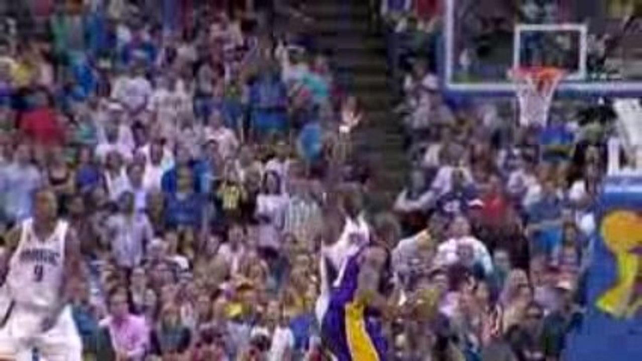 Kobe Bryant pump fakes and gets the shot to fall