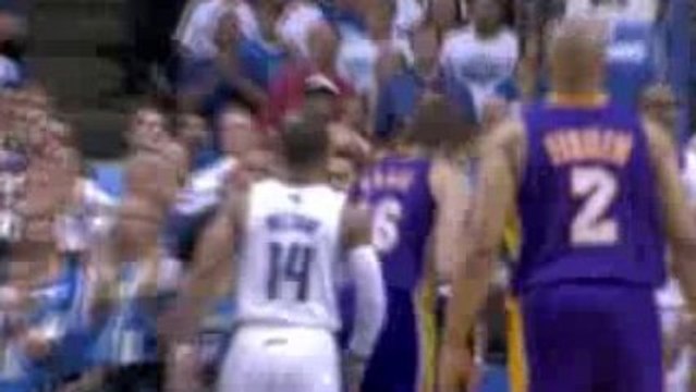 Kobe Bryant finds Pau gasol in the lane for the dunk.