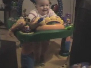 Vivien Enjoying Her ExerSaucer