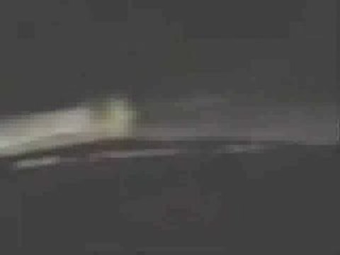 ALIEN GREY APPEARS FROM THIN AIR IN FRONT OF CAR