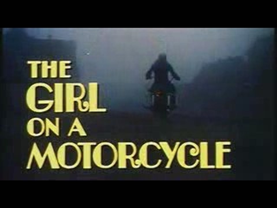The girl on a motorcycle